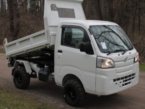 New Daihatsu HD Dump with bed raised from left front
